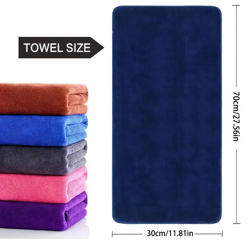 Soft microfiber towel perfect for camping, sports, swimming, and travel - dries quickly and absorbs well.