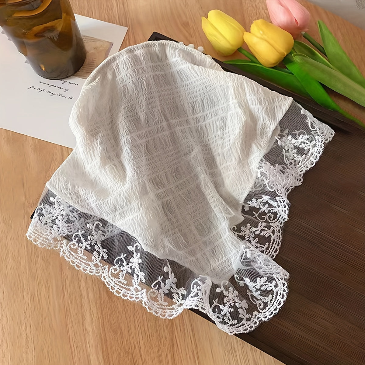 Chic lace knit triangle scarf doubles as sun protection headband for women, perfect for summer style.