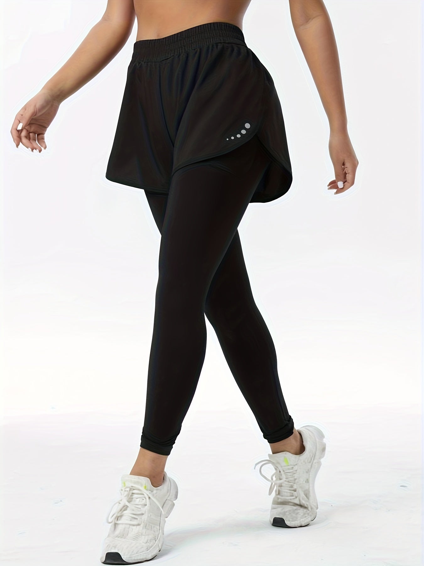 2-in-1 high-waisted sports leggings for women, made of knit fabric with a print pattern, pocket detail, and mid-stretch. Suitable for all seasons, made of a polyester blend.