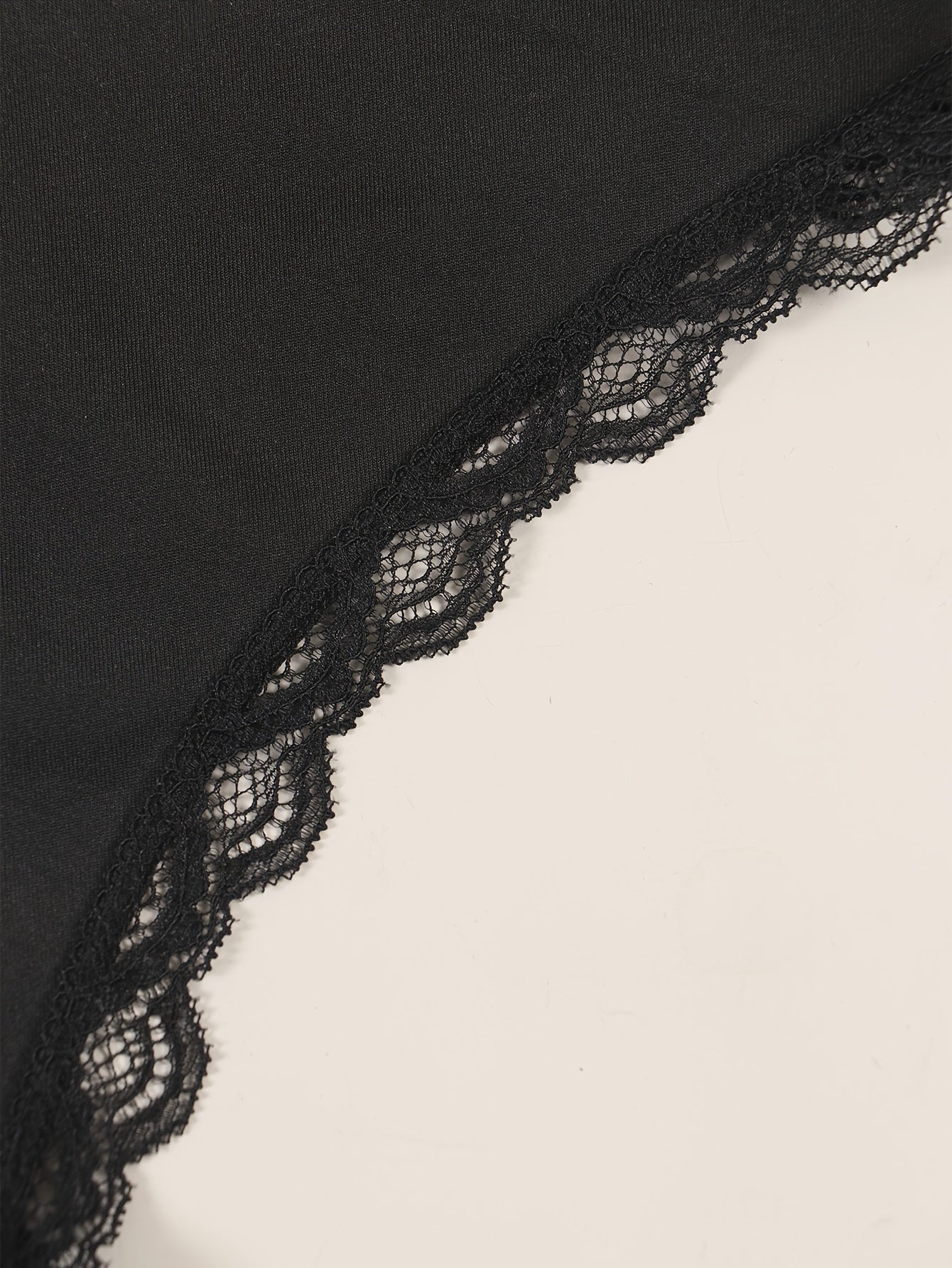 Sexy lace women's panties with delicate lace trim, comfortable and breathable nylon/elastane blend, non-see-through, hand washable in black.