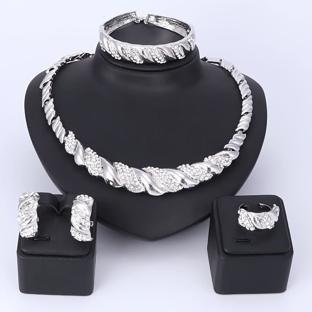 A stunning jewelry set, featuring a Middle Eastern-inspired design with gold-plated artificial crystals. This set includes a necklace, bracelet, earrings, and ring, perfect for women to wear at wedding parties or give as gifts.