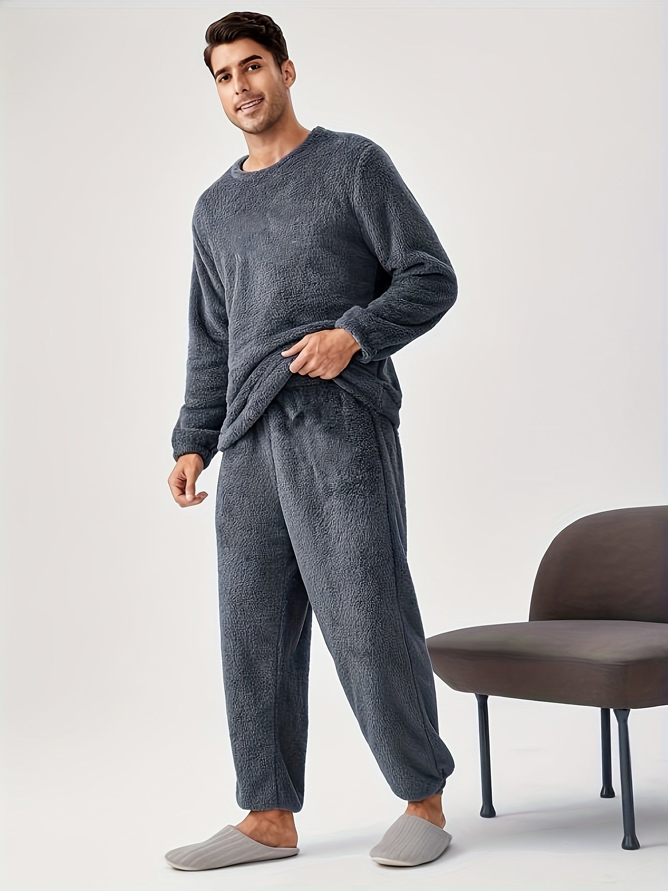 Men's cozy coral fleece pajama set - warm flannel loungewear with long sleeves & pockets for winter and autumn comfort at home.