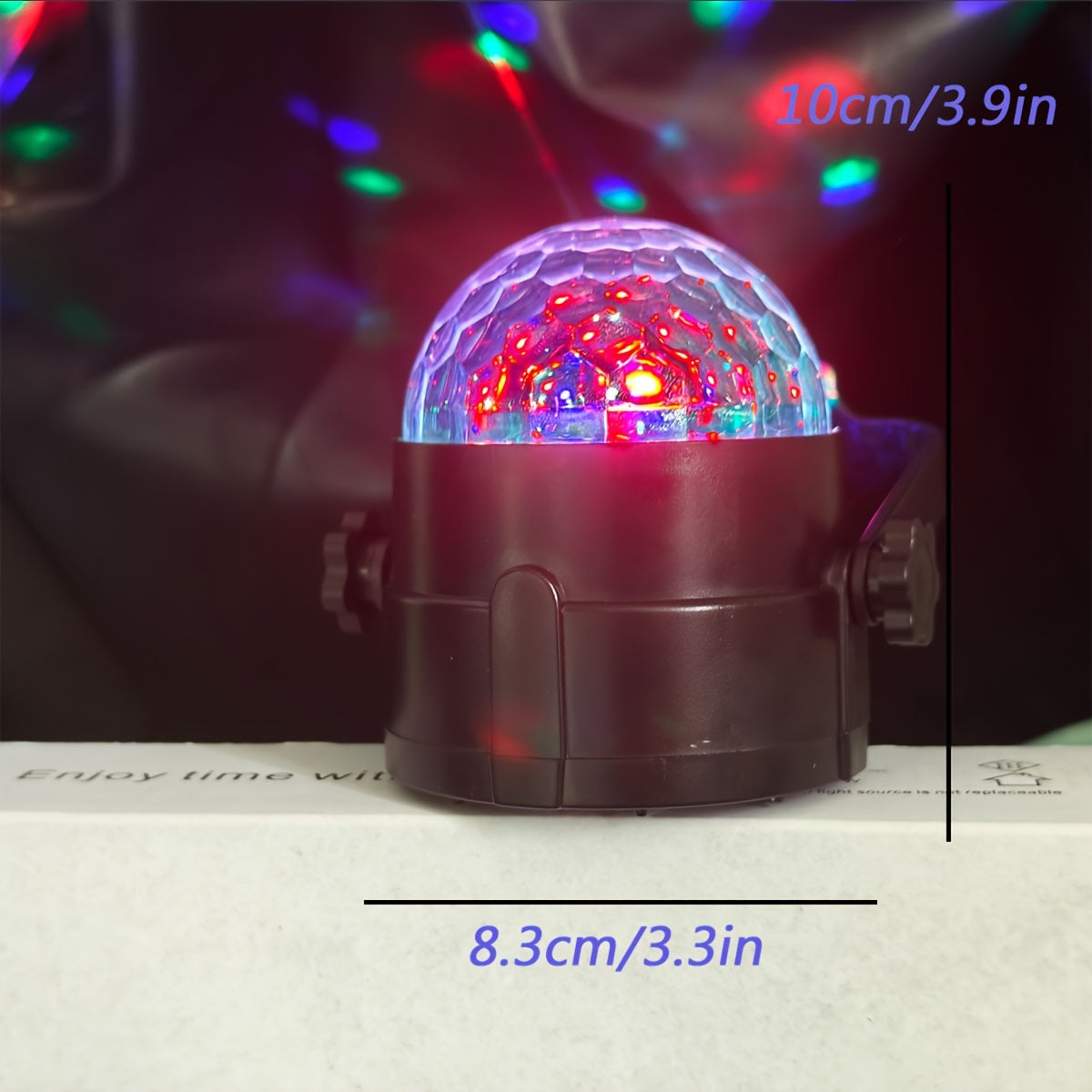 RGB Disco Ball Light with 7 lighting modes, remote control, USB-powered, freestanding plastic construction, ideal for home parties, bars, karaoke, weddings. No laser, multiple room use with button battery operation.