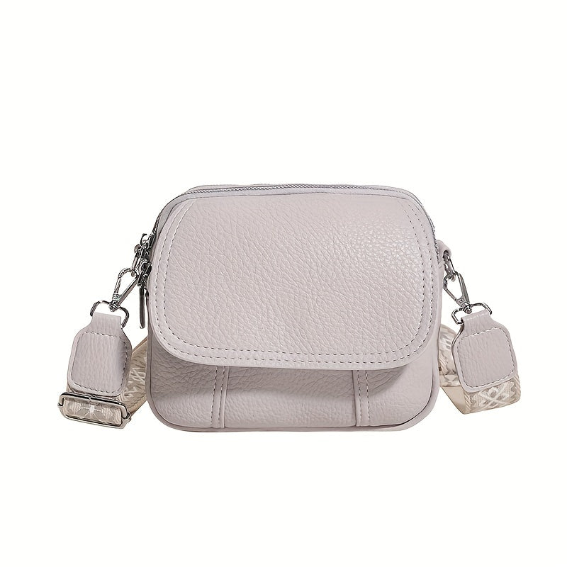 Square crossbody bag with wide strap and zipper, in solid color