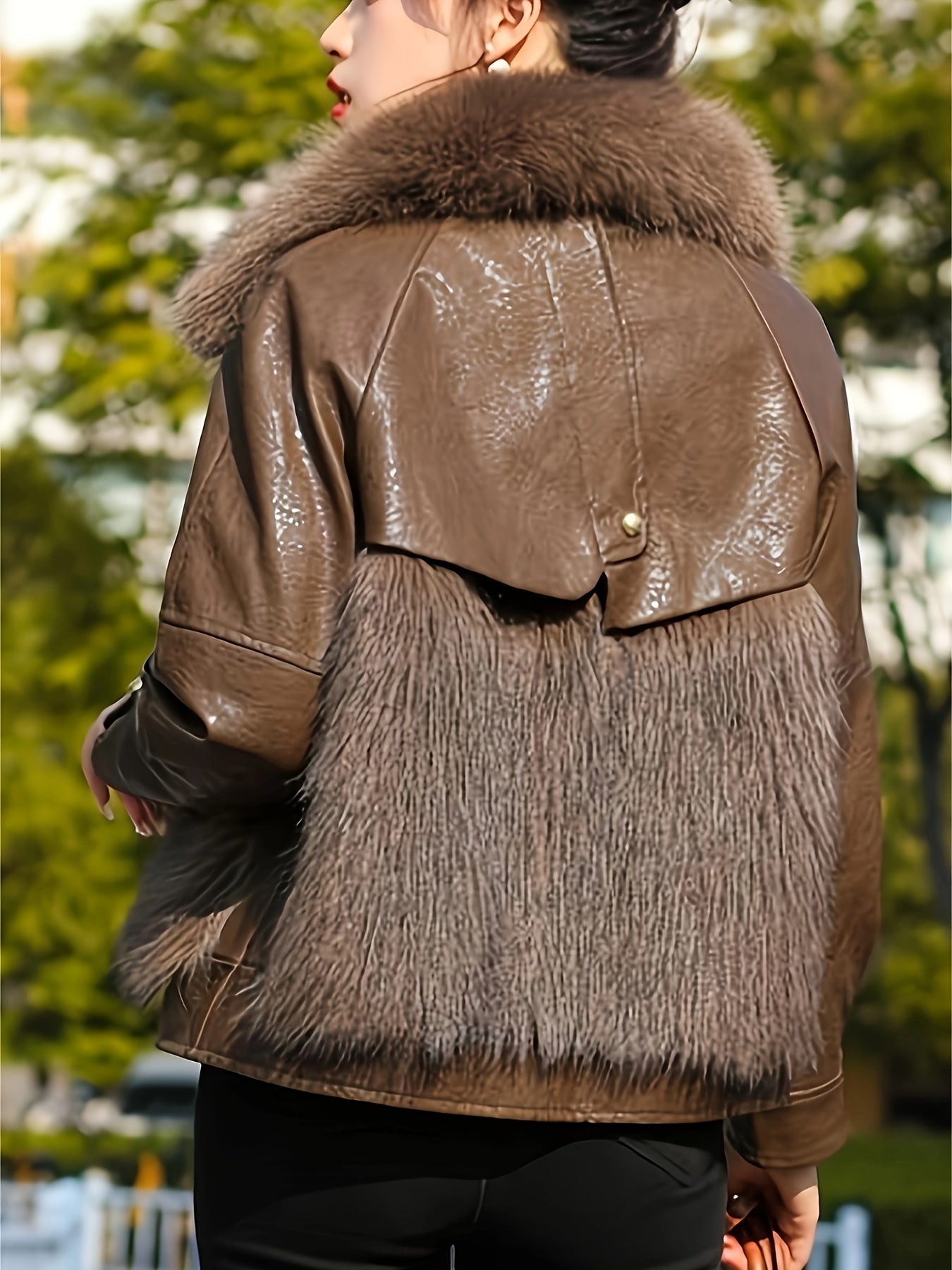 Women's faux fur-trimmed jacket with soft texture, button front, long sleeves, and side pockets for cozy comfort.