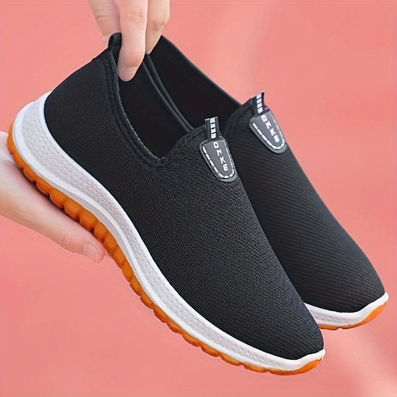 Casual slip-on women's fashion sneakers with breathable fabric and rubber sole for all seasons, featuring a low top European design.