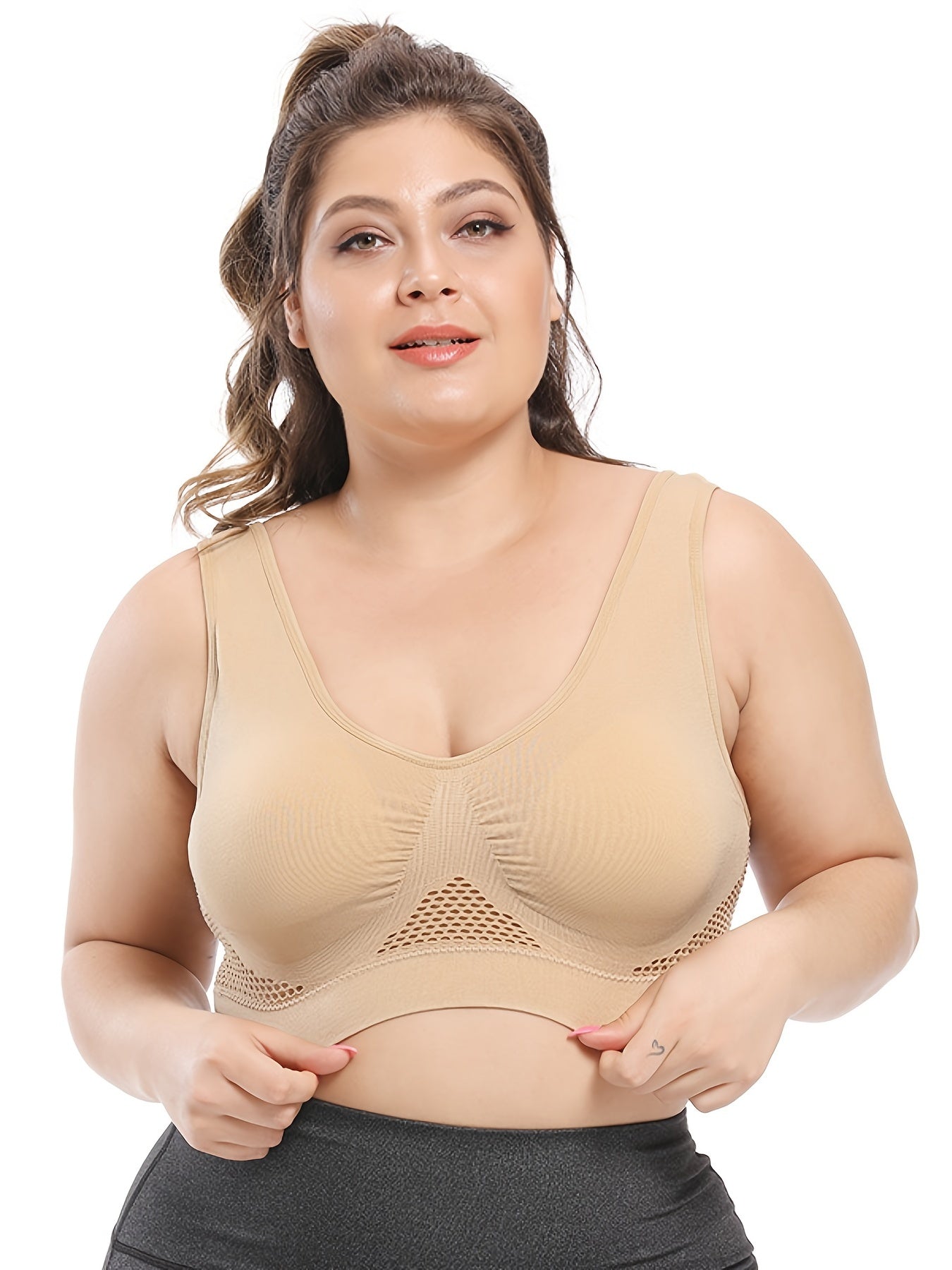 Seamless purple sports bra for plus size women, with breathable mesh fabric, push-up support, removable pads, and comfort fit. Available in sizes 36XL to 40XL.