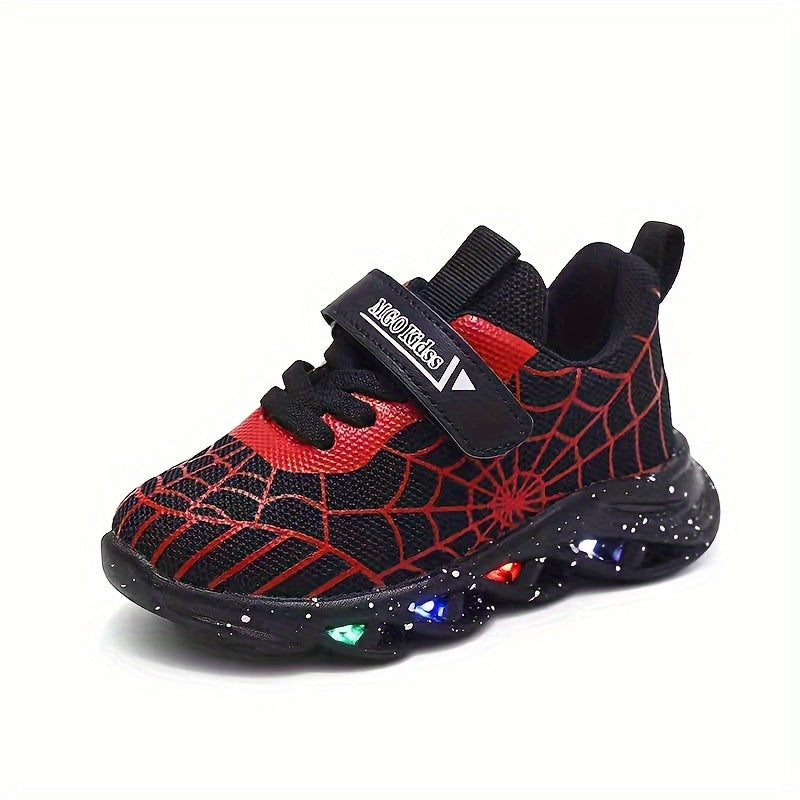 Durable rubber-soled boys' LED sneakers in red and blue with spider web design, breathable mesh, and hook-and-loop closure for casual wear and playtime.