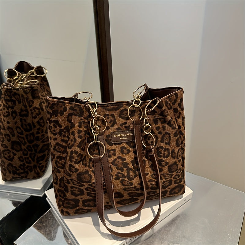 Stylish leopard print tote bag with large capacity for women, ideal for daily use with zip closure and fixed straps.