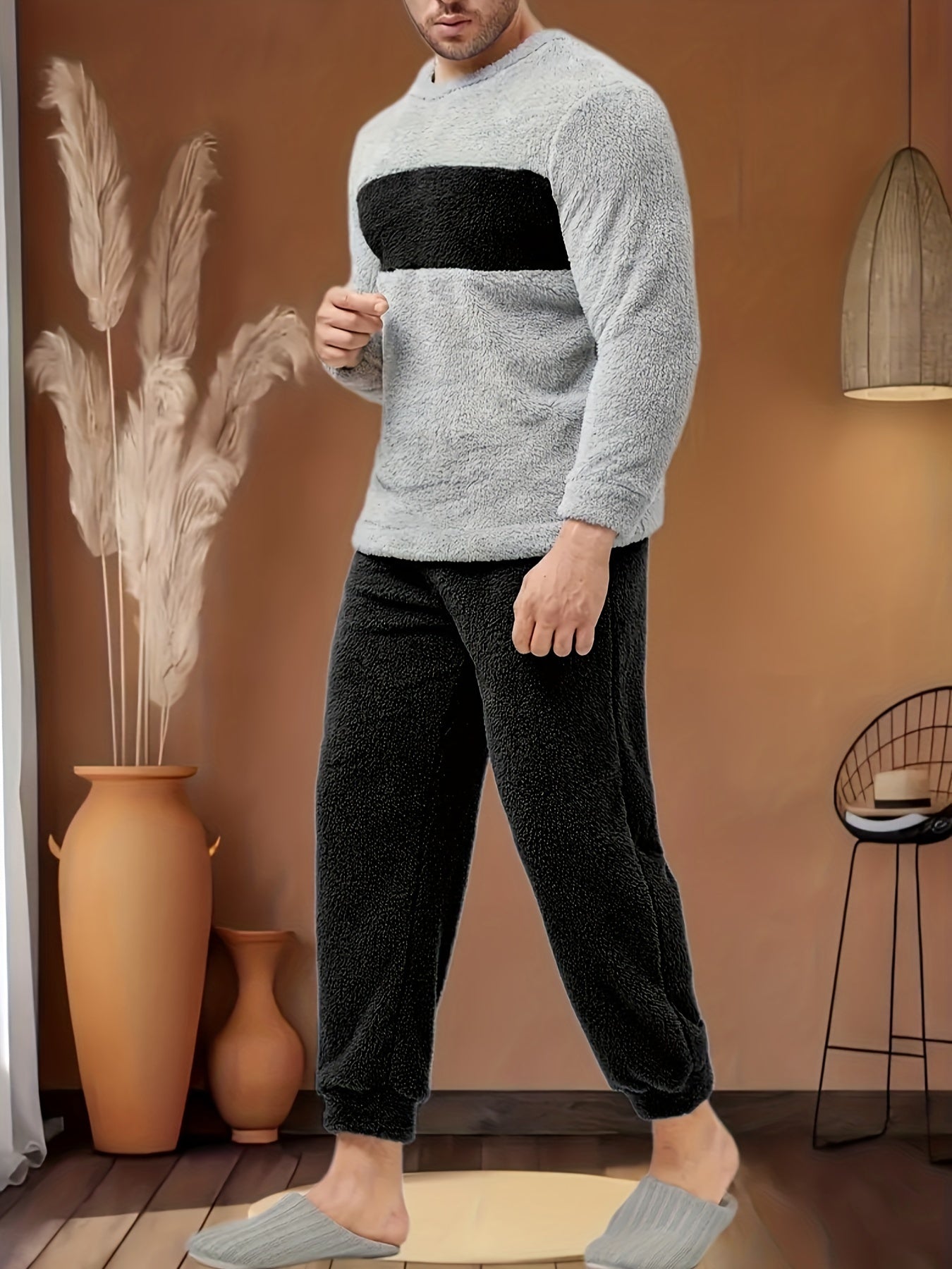 Men's cozy winter flannel pajama set with drawstring, loose fit, and round neck. Made from polyester knit fabric for casual home wear.