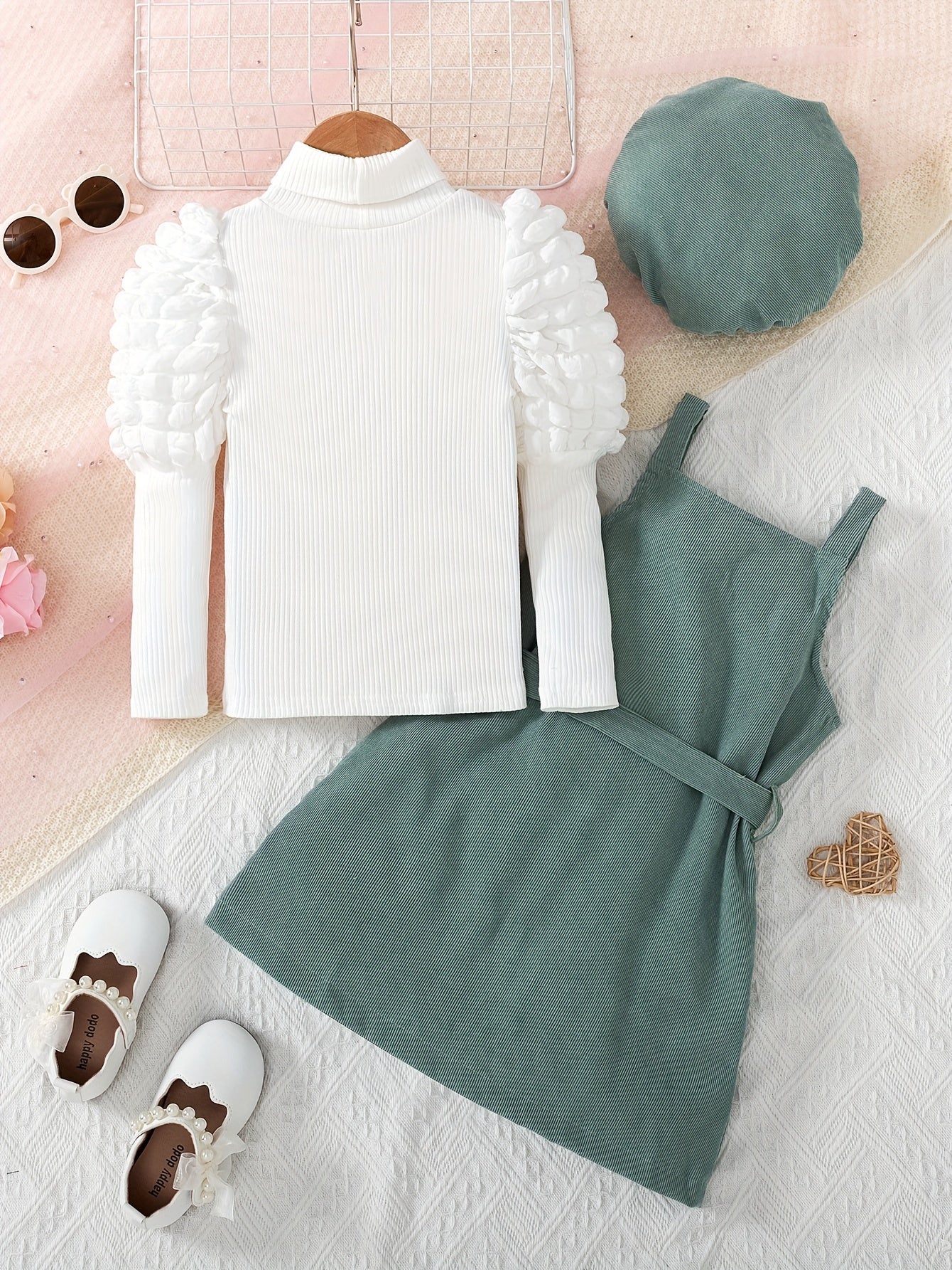 Stylish 4-piece girls' outfit set for fall/winter: turtleneck, jacket, suspender dress, and belt.