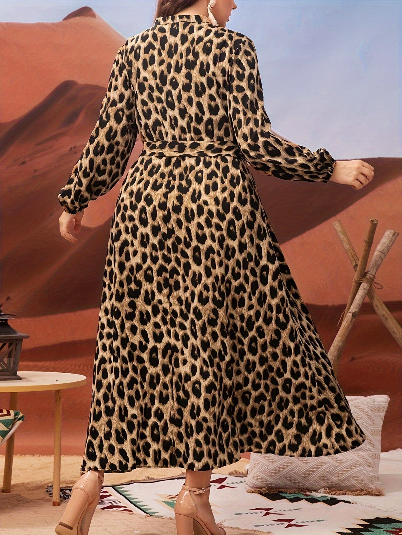 Plus-size leopard print dress with lantern sleeves, belt, collared neckline, and non-stretch polyester material. Machine washable and suitable for all seasons and occasions.