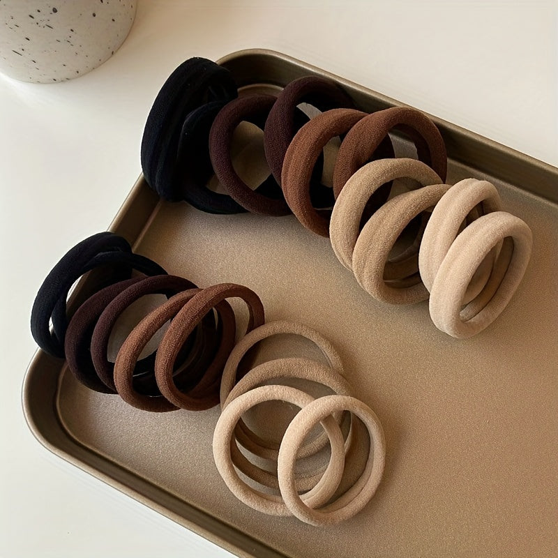 Solid color elastic hair rings in various quantities with anti-slip feature, suitable for daily use and holiday gifts.