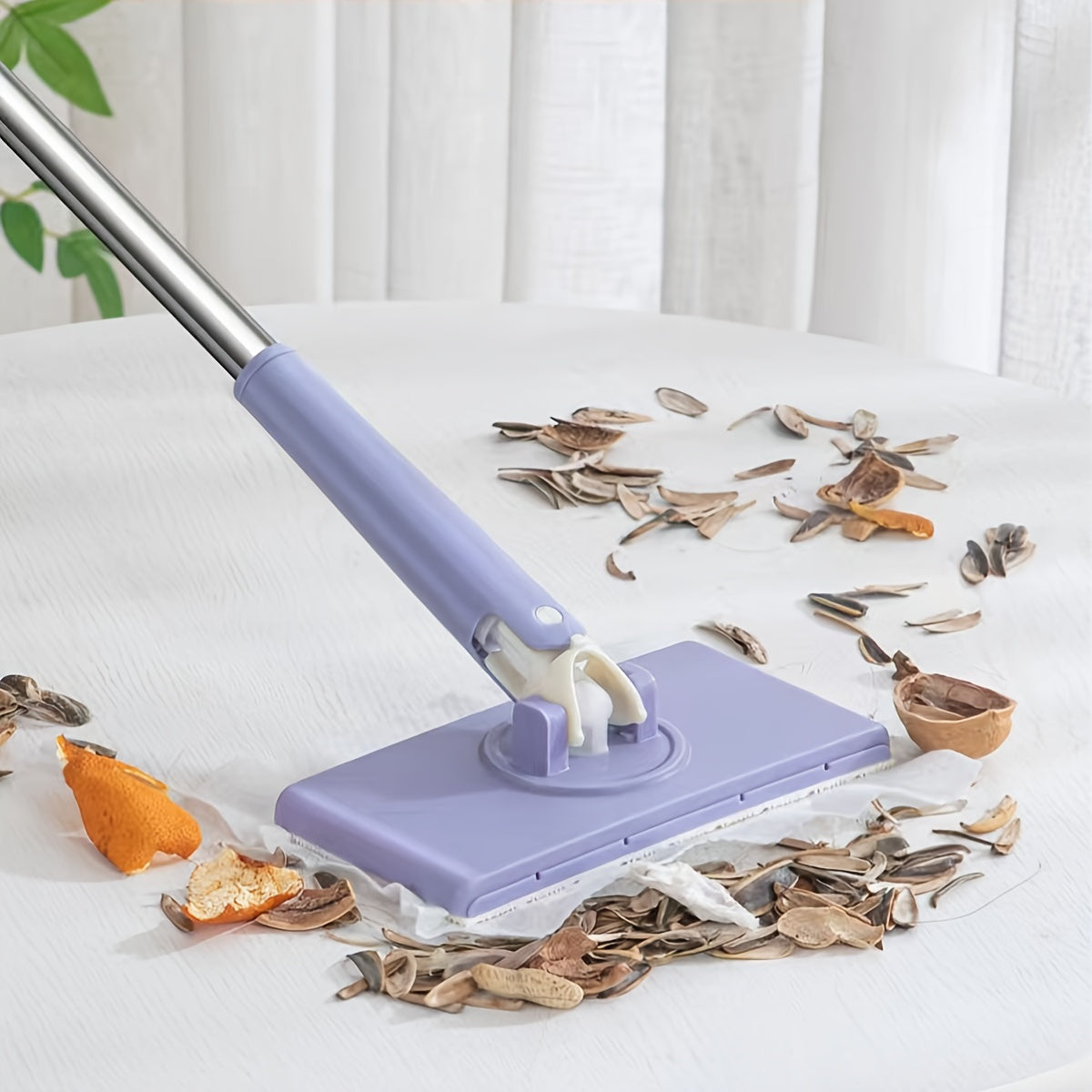 Get your hands on this versatile microfiber mop, featuring an automatic clamp and flat dusting wipe for use in the kitchen, living room, bedroom, and bathroom. This home cleaning tool is perfect for removing oil stains and keeping your floors fresh and