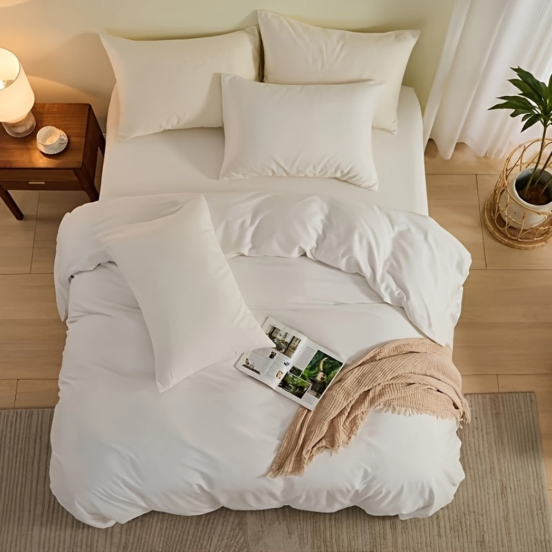 High-quality bedding set for home and hotel use, includes one duvet cover and two pillowcases. Made from soft, premium materials in a skin-friendly solid color design.