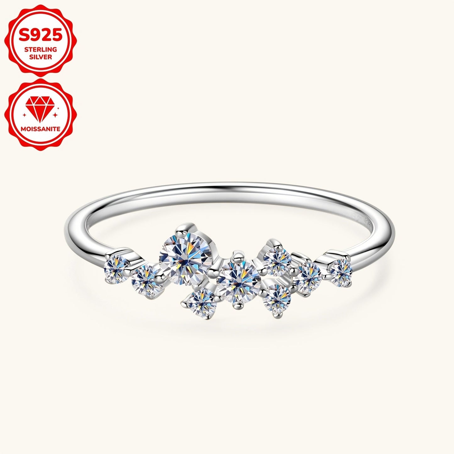 This delicate and stylish engagement ring for women is made of 925 silver and adorned with synthetic Moissanite stones. The ring features one 3mm stone, one 2.5mm stone, two 1.8mm stones, and five 1.6mm stones, totaling 0.3 carats. It is perfect for