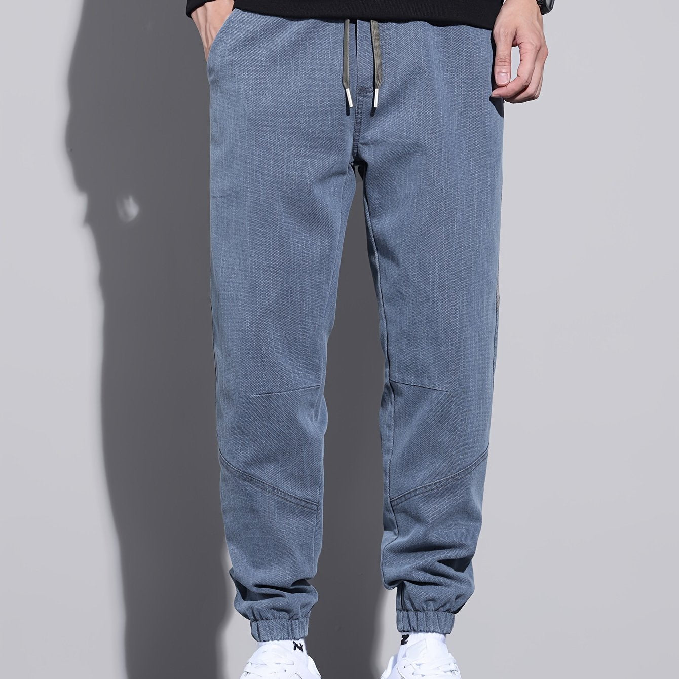 Men's casual drawstring sweatpants for fall and winter.