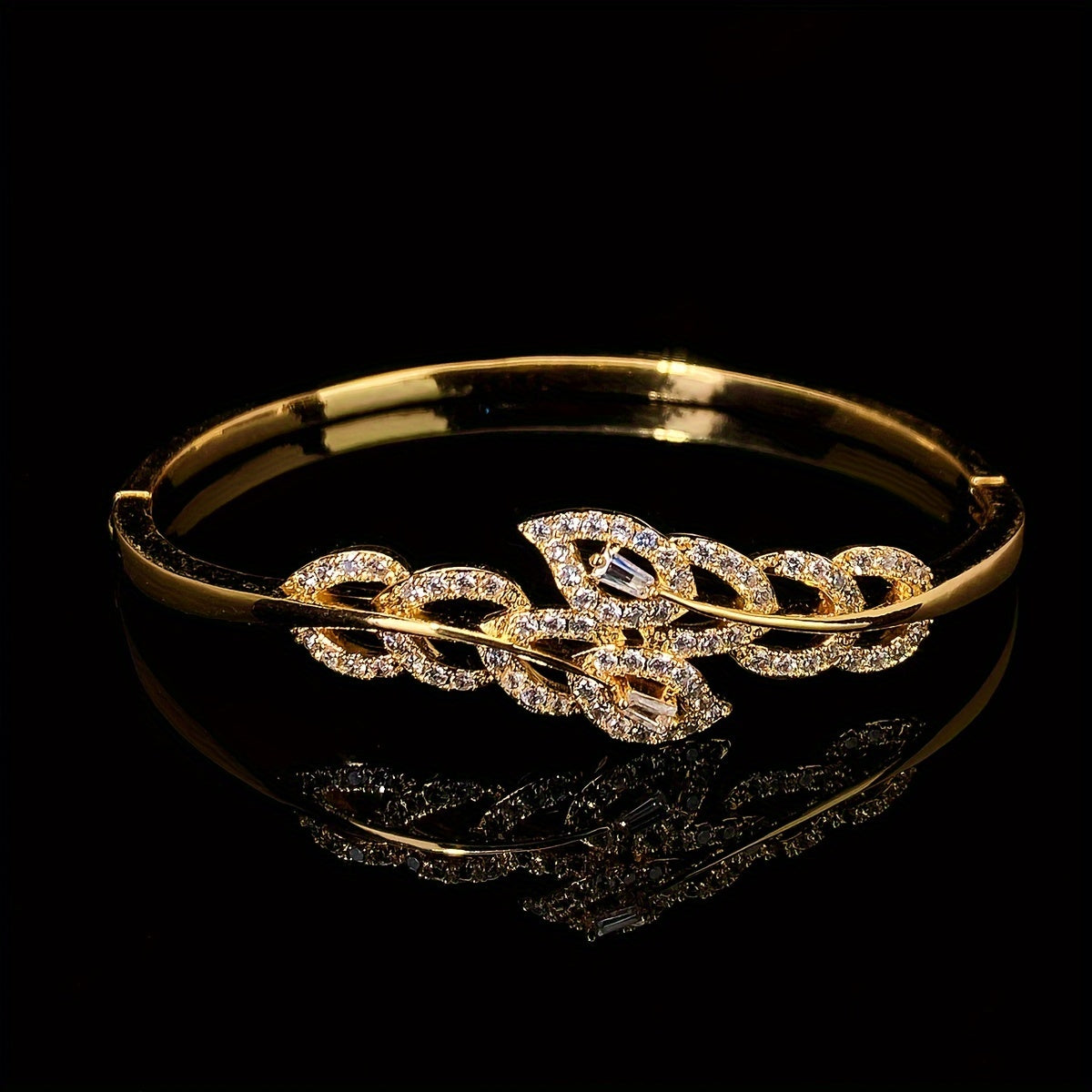 A high-end bracelet adorned with shiny leaf designs and micro-inlaid synthetic zirconia, adjustable for women, showcasing a unique and luxurious style.