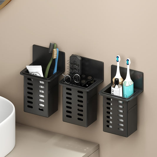 Wall-mounted storage box for toothbrush and toothpaste in black, with additional storage space for toiletries, mobile phone, and remote control. Easy, traceless installation.