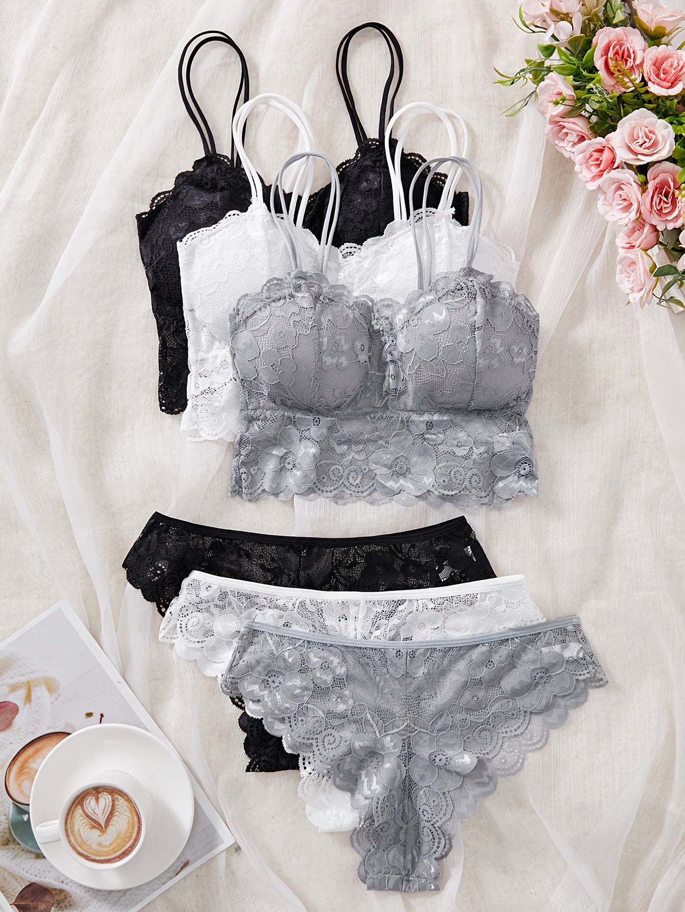 French lace bralette set with removable pads, low support, triangle thong, lace detail, solid color in black, white, or gray. Made of polyamide for adults.