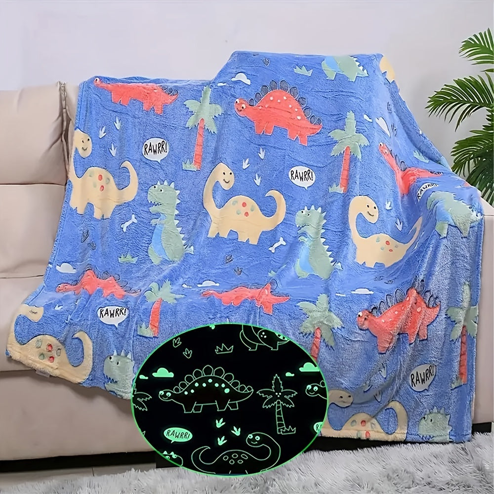 The perfect gift for dinosaur enthusiasts - a cozy blue luminous polyester throw blanket that glows in the dark.