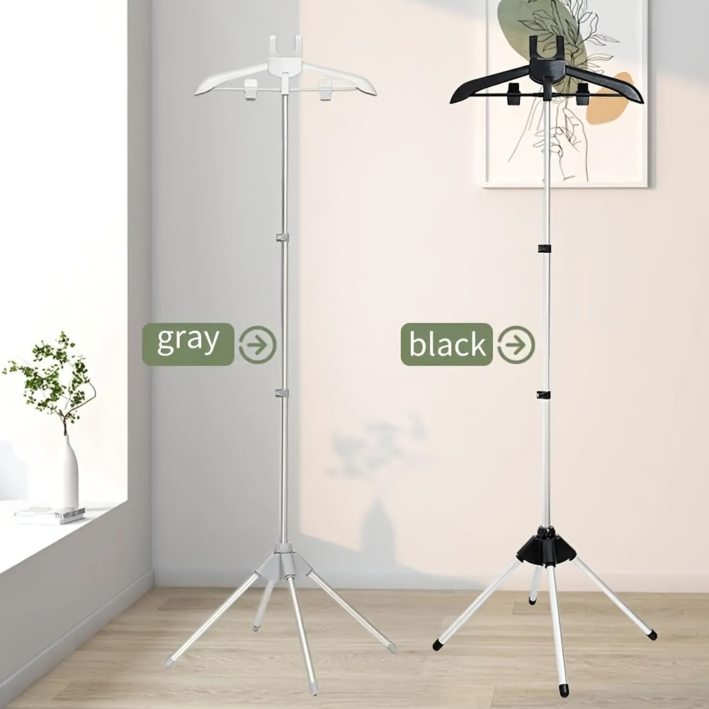 Portable adjustable height clothes steamer stand with foldable independent support rack made of plastic material. Space-saving design for convenient ironing and storage.