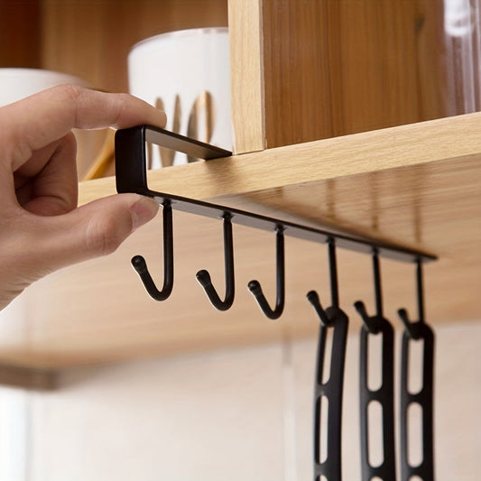 Keep your kitchen cups, mugs, and utensils organized with this durable iron under cabinet hanging storage organizer. Includes 6 detachable hooks for easy access. Perfect for saving space in your home or office.