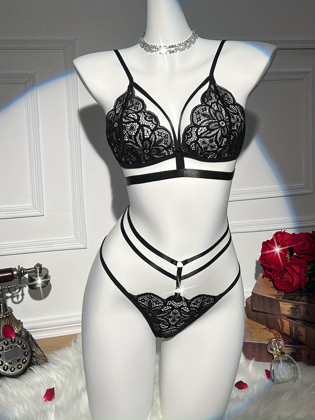 Sexy floral lace lingerie set includes a cut-out push-up bra and strappy thong.