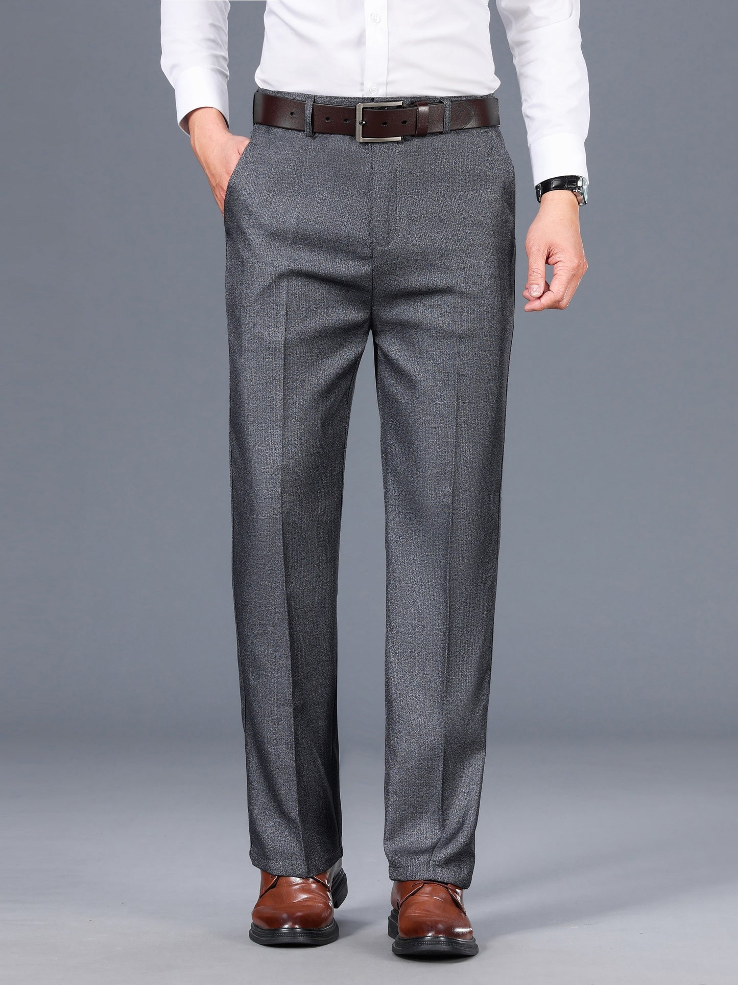 Gray dress pants for men with a straight fit, medium thickness, slant pockets, zip closure, and non-stretch polyester fabric. Suitable for business casual or formal wear in spring and