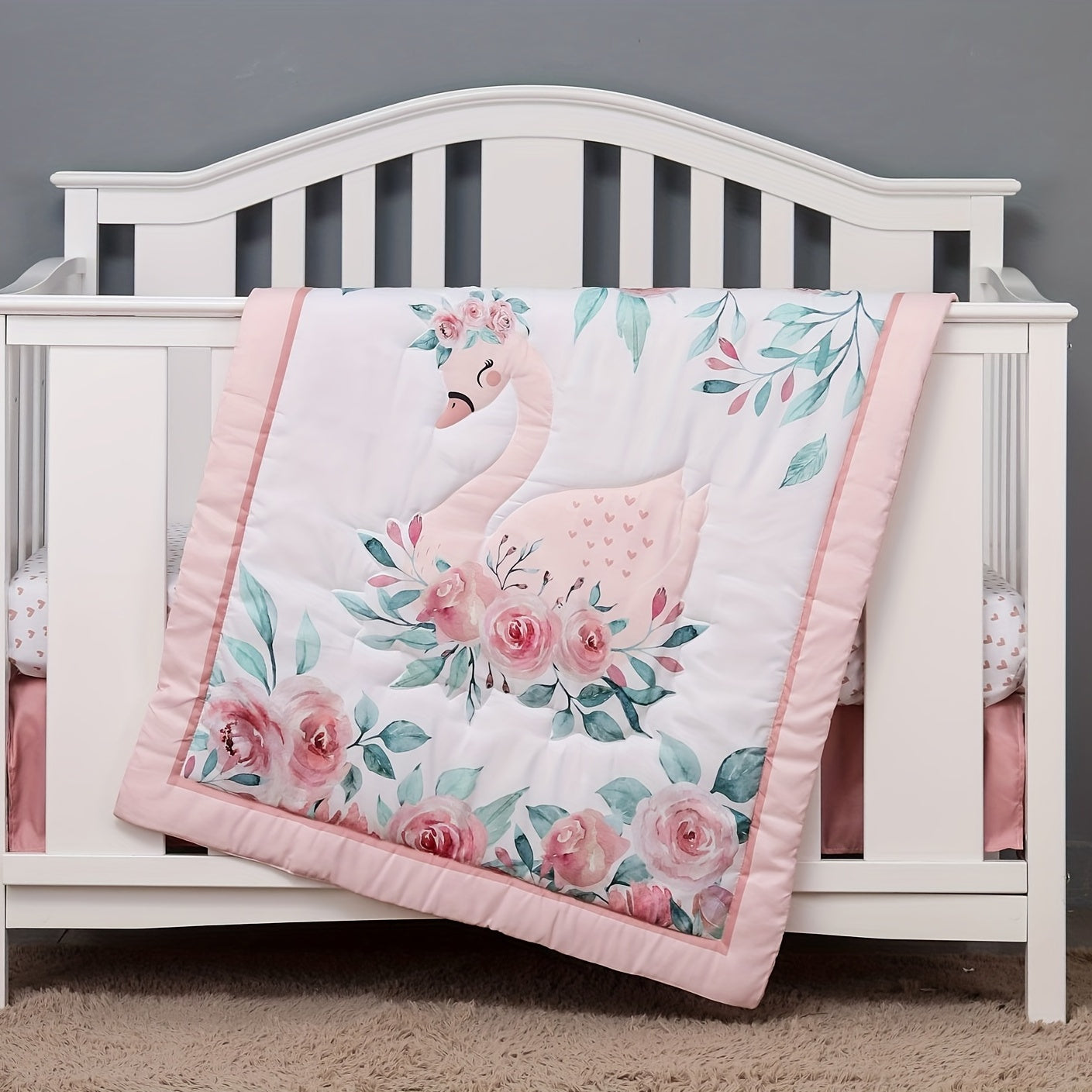 Machine washable soft polyester blanket measuring 83.82x106.68cm, featuring a swan animal print design suitable for all seasons. Perfect for boys and girls as a cot comforter or crib bedding throw.