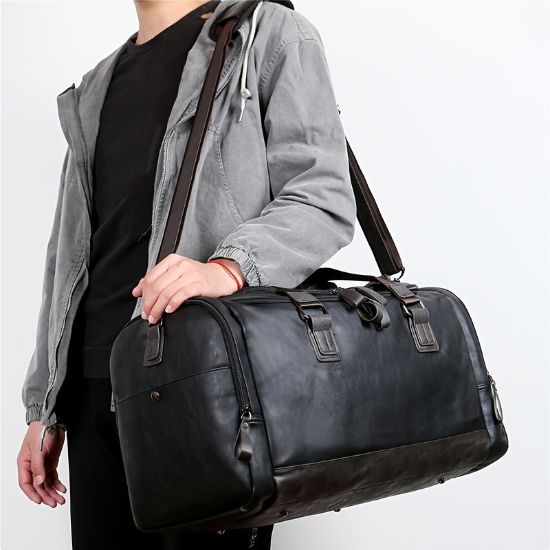 Large men's duffel bag with adjustable strap and multiple compartments, perfect for casual carry-on travel and weekend outings.