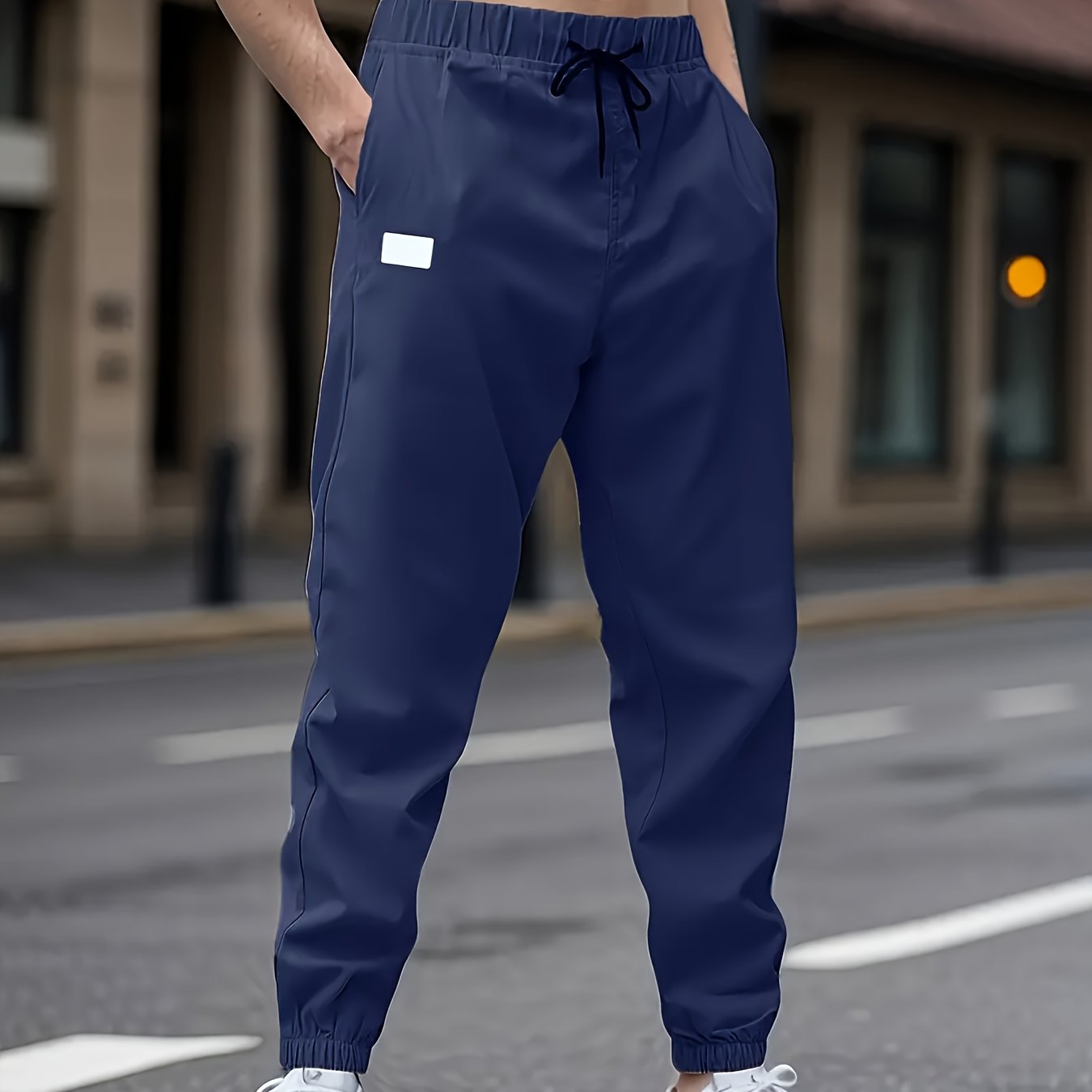 Men's casual cargo pants with drawstring waist, non-stretch polyester fabric, regular fit, lined with polyester, ideal for weekend wear.