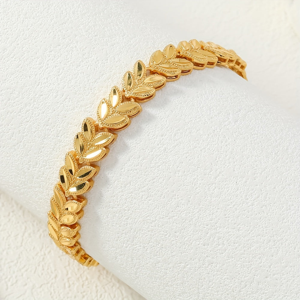 A luxurious tribal design bracelet plated in 24K gold, featuring a unique copper wheat sheaf design. This adjustable open cuff is perfect for women and makes an ideal gift for any occasion, including weddings and Valentine's Day. Versatile enough for all