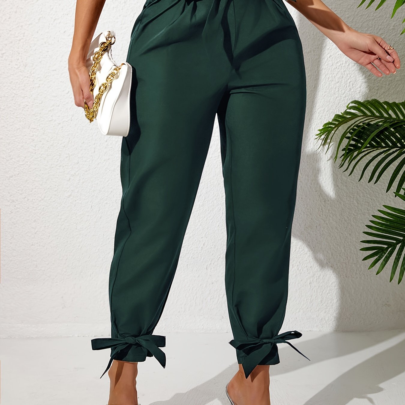 Solid straight leg pants with elastic drawstring waist and elegant bow detail. Perfect for spring and summer in plus size.