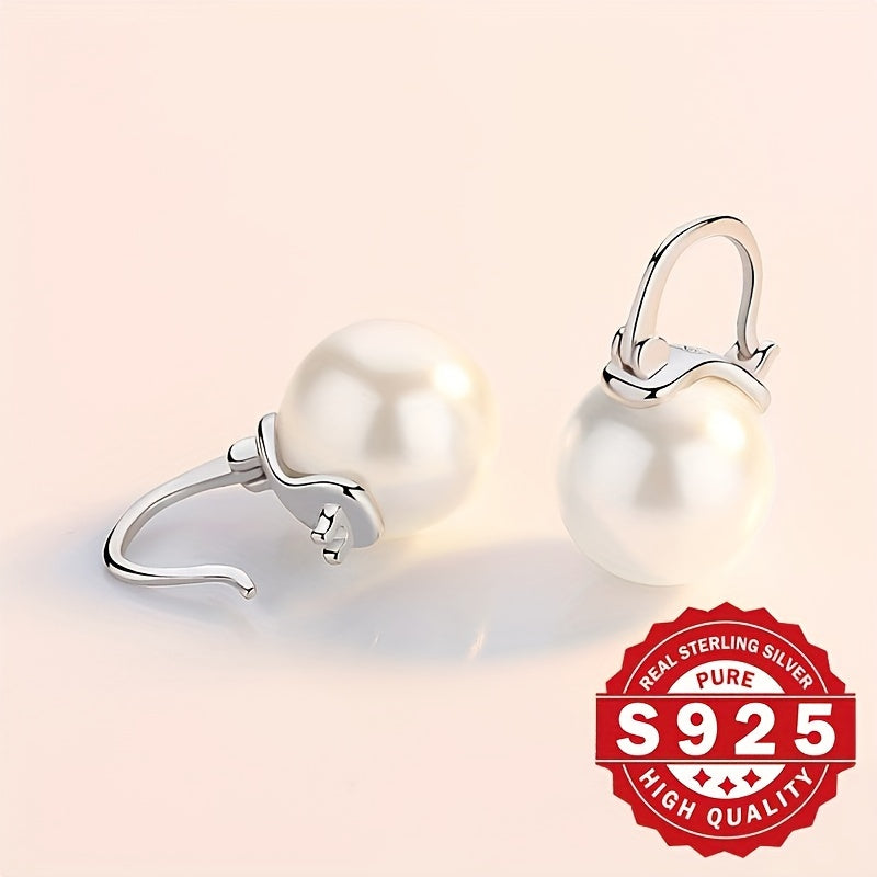 Elegantly crafted from S925 sterling silver, these stunning ladies' earrings feature arched shell pearls that exude exquisite charm. Perfect for wearing at banquets and weddings, this pair makes a great gift option as it is low in allergens and