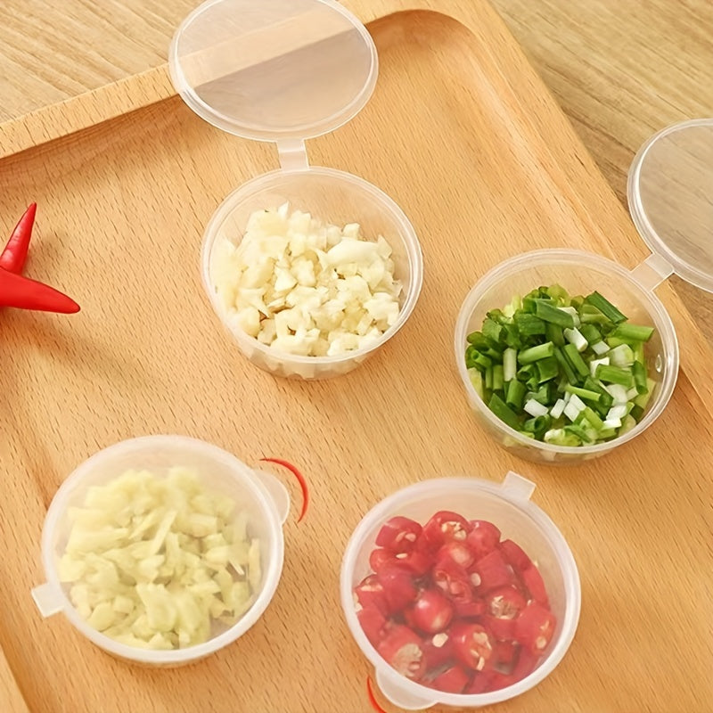 50 transparent disposable sauce boxes for takeout, packaging, and seasoning. These multipurpose food storage boxes come with covers.