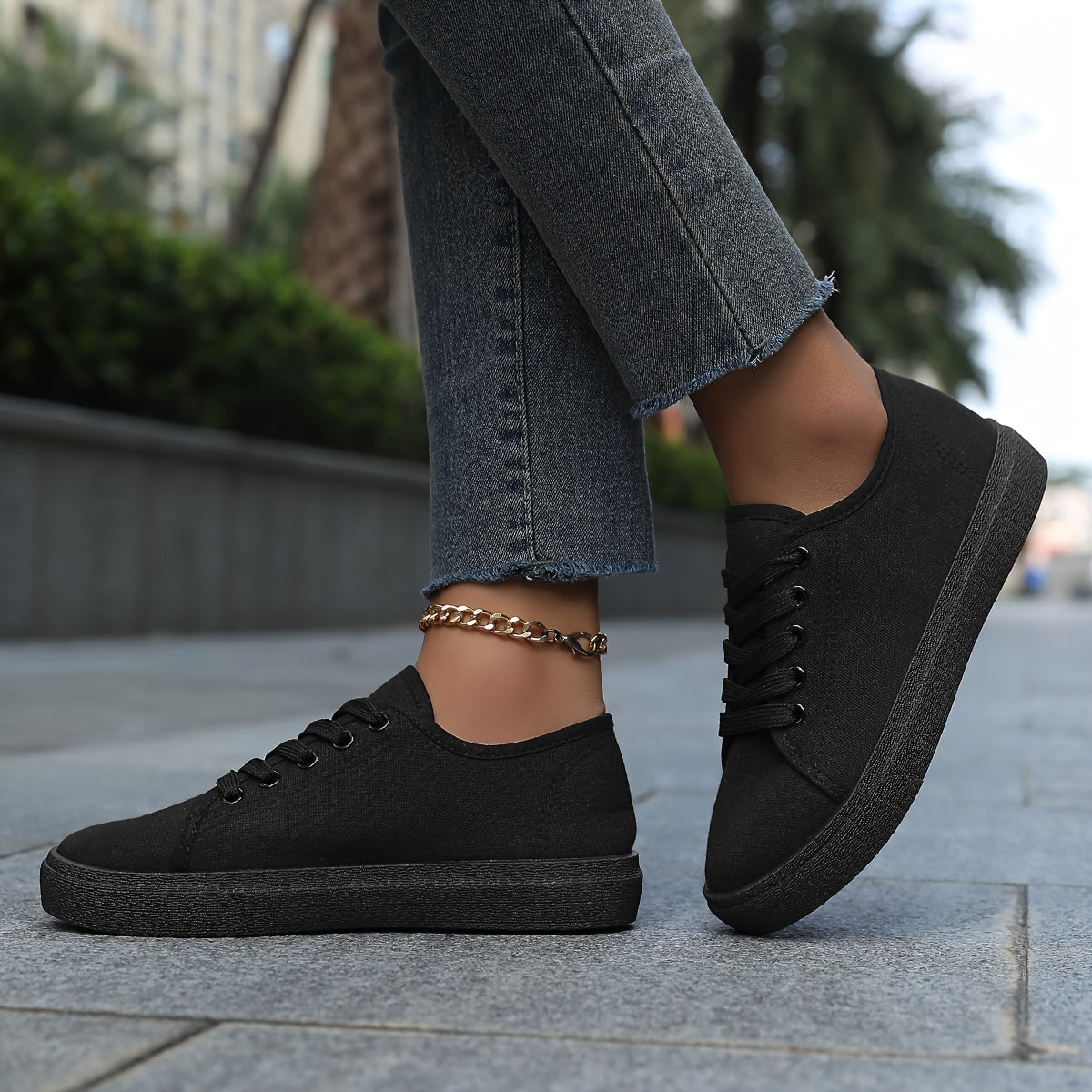 Women's platform skate sneakers with breathable fabric upper and durable PVC sole. Versatile casual shoes for walking and outdoor activities in black and white. Features comfort insole.