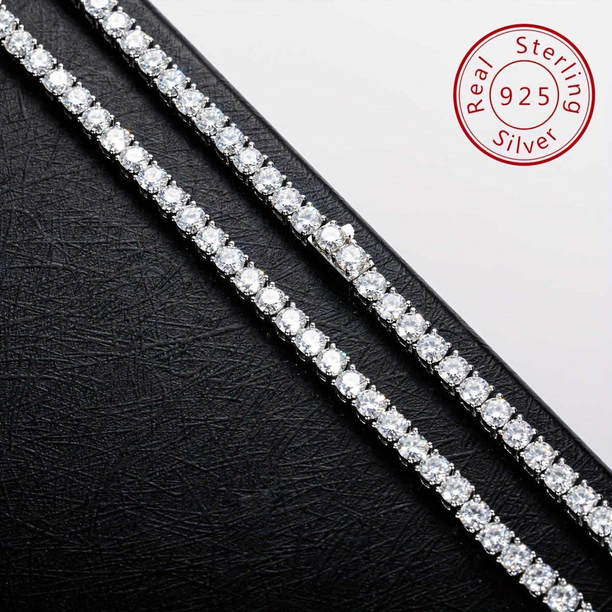 This exquisite Cuban hip hop fashion necklace features a 4.0mm mixed row of Moissanite stones set in 925 sterling silver. Available in 18, 20, 22, and 24 inch lengths, with 106, 118, 129, and 142 pieces respectively. Weighing approximately 38.5 grams