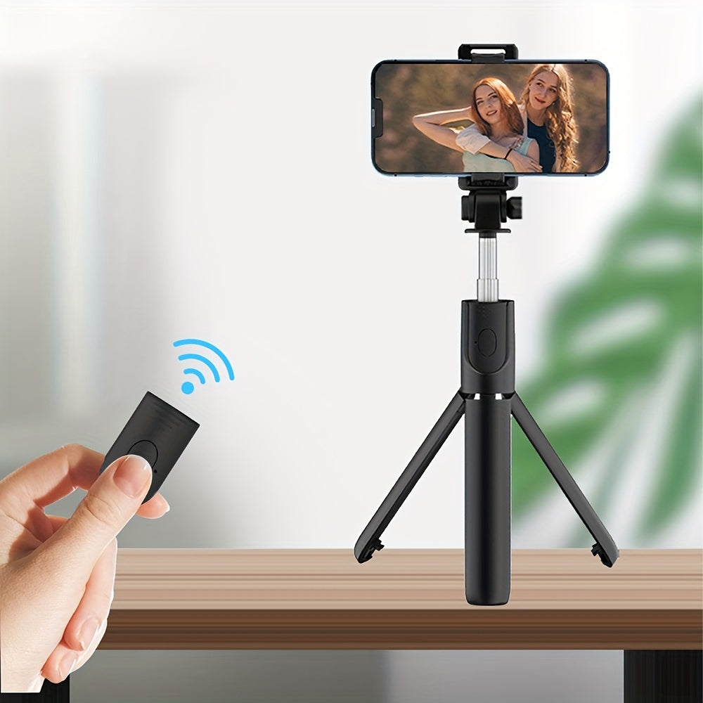 Specialized floor tripod with mini rotating phone holder and wireless selfie stick for stable vlogging and live streaming on the go.