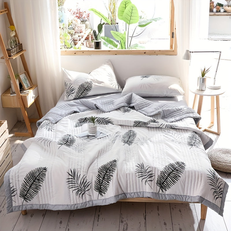 Modern hypoallergenic quilt with floral pattern, plaid pieces, and embellishments. Made of all-season polyester, machine washable, multi-functional, suitable for single/double beds.