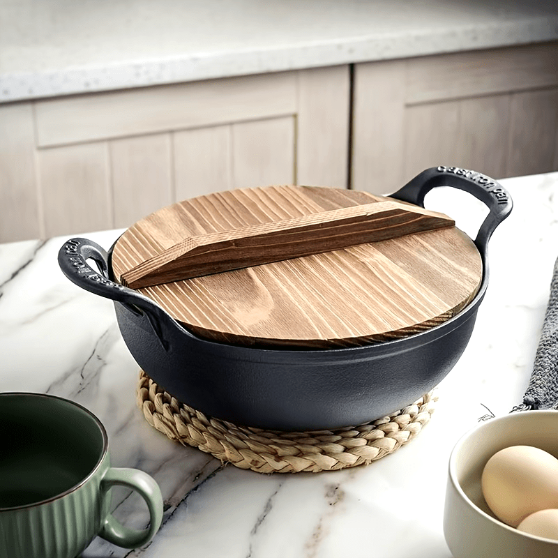 One-piece Double-ear Cast Iron Yuan Treasure Pot featuring a Classic Wooden Lid. This versatile pot can be used as a Flat Bottom Frying Pot, Stew Pot, or Multi-functional Non-coated Non-stick Pot. Suitable for use on Gas Stoves and Electric Magnetic