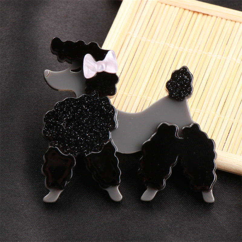 Add flair to your outfit with this Acrylic Black Poodle Brooch! This unique pin exudes charm and adds a touch of sophistication to any look. It makes a perfect accessory gift for friends during the holiday season.