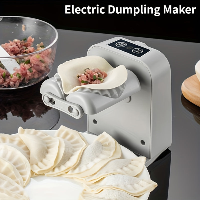 Introducing the 2023 Rechargeable Fully Automatic Dumpling Wrapper Machine for Home Use. This electric machine can wrap up to 1500 dumplings when fully charged. Say goodbye to manual wrapping with this kitchen essential!