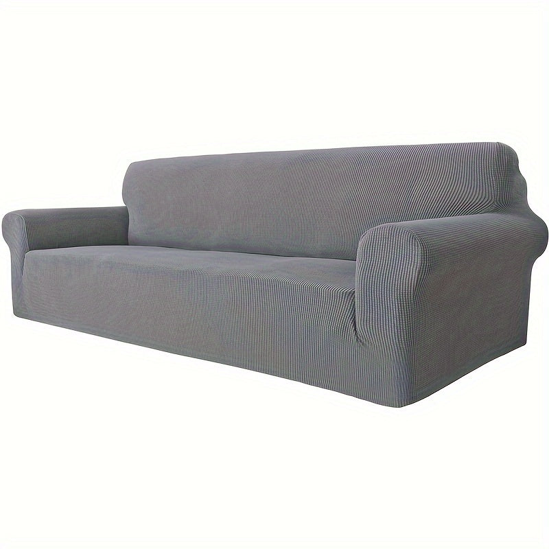 Jacquard fitted sofa slipcover with elastic band, machine washable polar fleece fabric. Compatible with various sofa sizes. Protects furniture from dust and cat scratches.