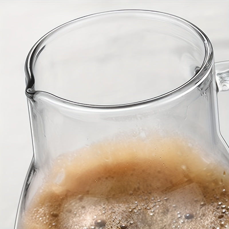 Classic glass cold brew coffee pitcher, 24oz capacity, perfect for making manual pour-over iced coffee. This versatile pitcher can also be used for juice, tea, and sharing at home. No electricity needed, just a stylish and functional glass jug with a