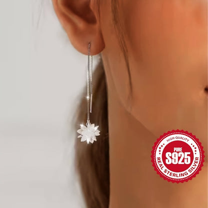 This S925 Silver Long Tassel Ice Flower Ear Thread is both elegant and stylish, perfect for ladies looking for a versatile fashion accessory. Ideal for weddings, graduations, and everyday wear, this lightweight piece weighs only 4g and is hypoallergenic.