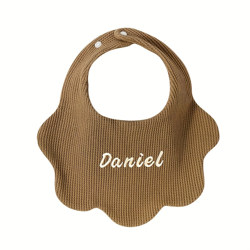 Customize your baby's style with our Personalized Drool Bibs. These bibs feature custom embroidery, an adjustable snap closure, and soft absorbent knit fabric. They make the perfect gift for a baby shower or holiday. Suitable for babies aged 0-3 years