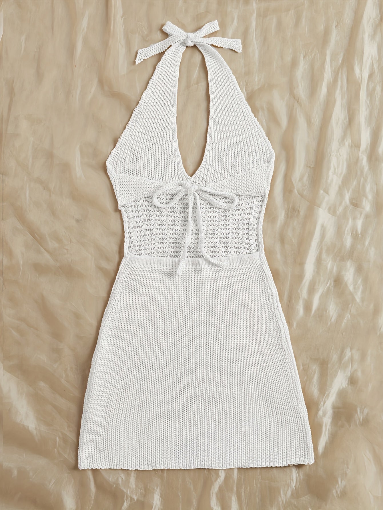 White halter tie neck backless cover up dress with a vacay style, knit fabric. Feminine swimwear and clothing for women.