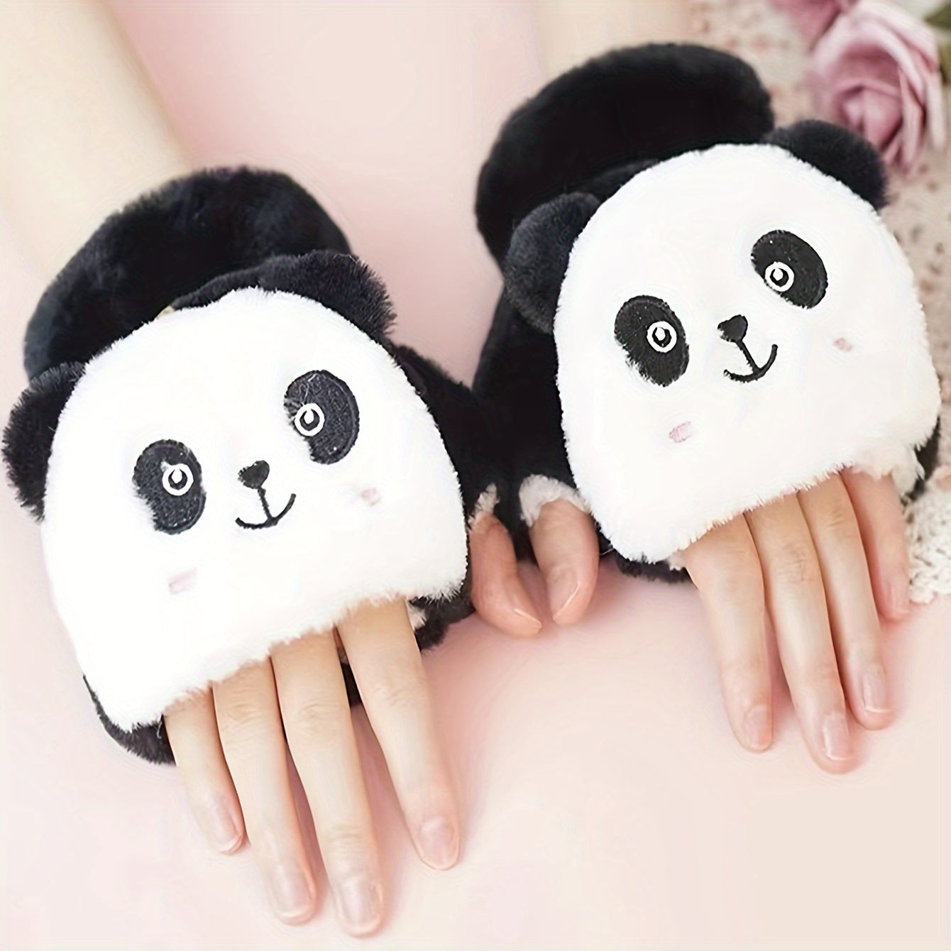 One pair of adorable animal cartoon-themed women's polyester winter mittens with flip tops. These thick, plush fingerless mitts provide warmth and decoration, perfect for casual weekend use. The embroidered design adds a touch of charm to this