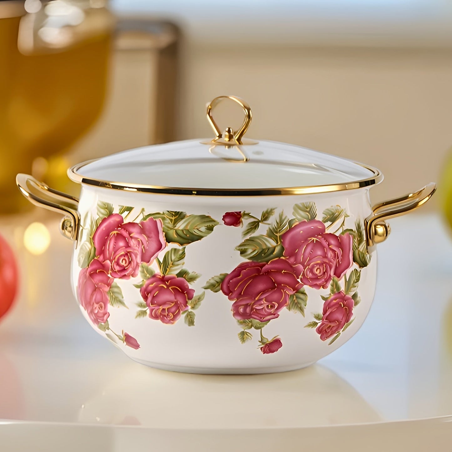 Luxurious stockpot with gold handle and lovely rose flower enamel design. Comes with a durable glass lid and is offered in four different sizes. Perfect for high-end cooking in your home or outdoor kitchen.